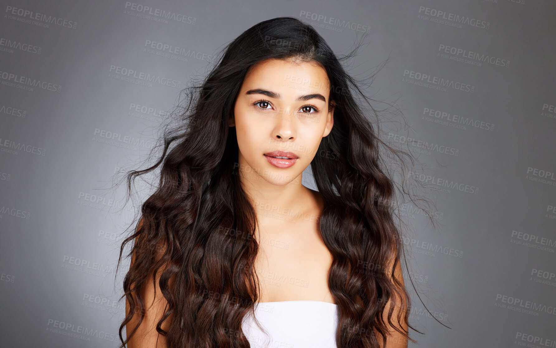 Buy stock photo Hair, hair care and woman, face and beauty, glow and shine with keratin treatment. Cosmetic mockup, waves and texture with hair style with studio background. Wellness, self care portrait and growth.
