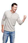 Happy, man and promotion in celebration for winning, discount or goal against a white studio background. Isolated male model winner with smile celebrating win, sale or achievement on mockup