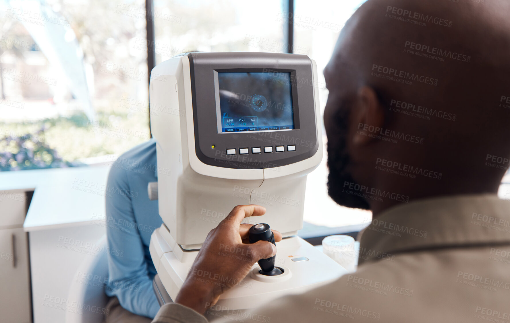 Buy stock photo Eye exam by a doctor looking and checking the vision of a patient at a sight specialist office. Medical healthcare screen technology helping an optometrist see retina health and wellness 