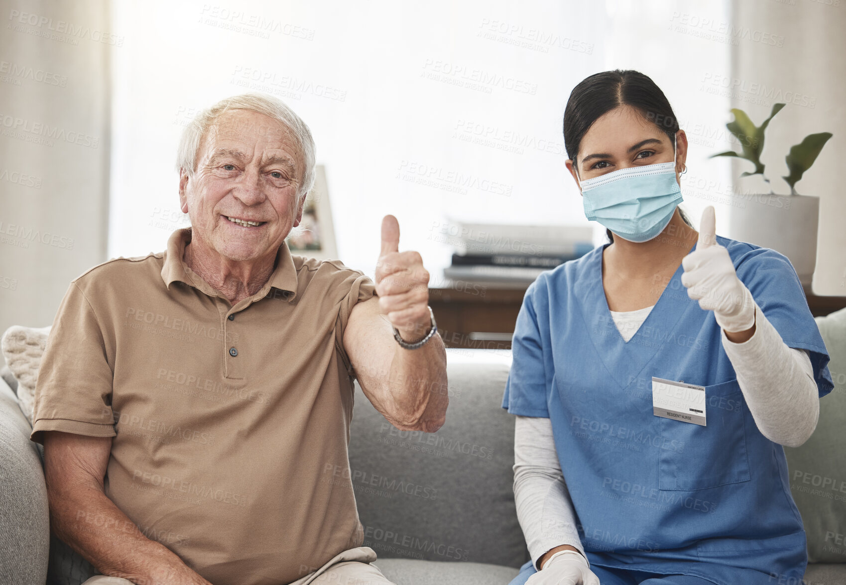 Buy stock photo Shot of an elderly man and a young female nurse showing a thumbs up during a checkup at home
