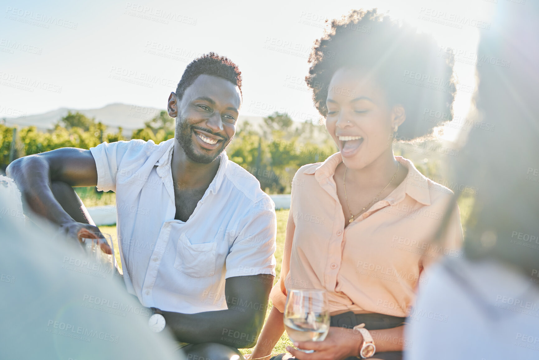 Buy stock photo Happy, wine or couple of friends at a picnic relaxing or bonding on a summer holiday vacation in nature. Smile, black woman and funny black man enjoying quality time and drinking alcohol in a park