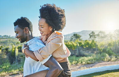 Buy stock photo Love, black couple and piggy back in countryside, travelling and bonding for vacation, relationship and break. Romance, man carry woman and loving on weekend, holiday and honeymoon to relax and smile
