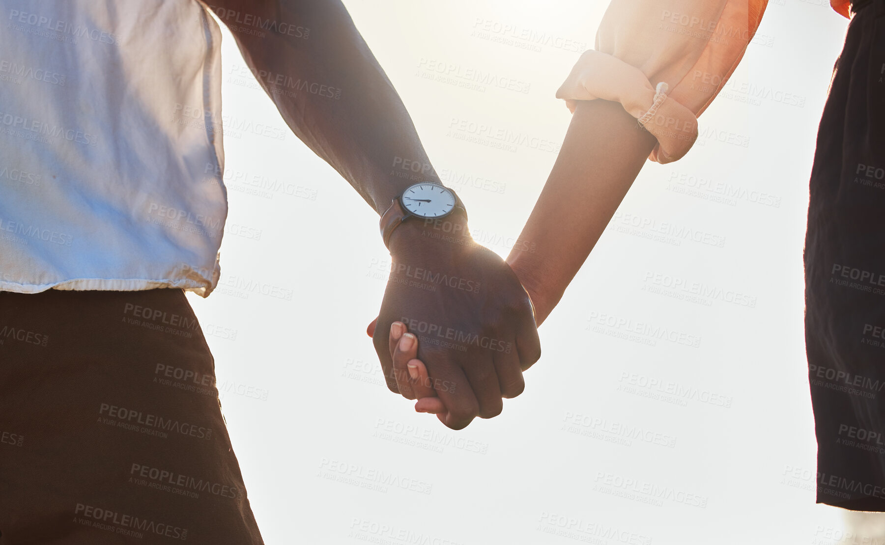 Buy stock photo Love, flare and African couple holding hands, bonding and enjoy outdoor romantic quality time together. Peace, freedom and sunshine for calm black woman, man or people on marriage anniversary date