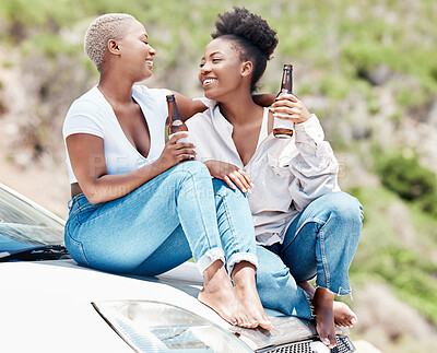 Buy stock photo Car, beer and lesbian couple on a road trip love relaxing in nature together in summer drinking alcohol outdoors. Drunk, smile and happy African LGBT girls or women in fun relationship or friendship
