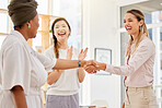 Handshake, welcome and thank you with businesswomen in teamwork, collaboration and communication in office. Success, b2b partnership and trust or happy business, shaking hands and corporate meeting.