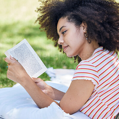 Buy stock photo Black woman reading book, relax in park and picnic blanket with novel in nature. Education, learning and female student in Brazil in college or university campus on grass field studying with textbook