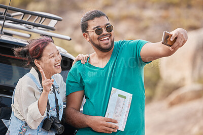 Buy stock photo Couple, travel and road trip selfie with peace sign, map and smile while on a stop outdoor for social media streaming on vacation, journey and adventure. Asian, woman and man together for phone photo