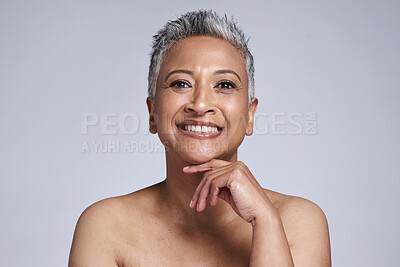 Buy stock photo Beauty, skincare and portrait of senior woman for facial makeup. Anti aging, wellness and smile with face of mature model against gray background in studio for health or dermatology