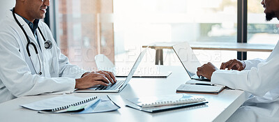 Buy stock photo Healthcare, laptop and doctors in meeting room planning surgery schedule at table in hospital boardroom. Teamwork, clinic and innovation in medical research, happy men in medicine working together.