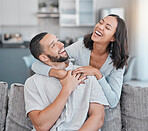 Couple relax on sofa, laugh and smile together with love, support and hug partner in living room of modern apartment home. Black woman, happy man and peace in lounge with wellness bonding on a couch