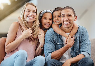 Buy stock photo Kids, interracial and family on sofa for portrait, happy family and home together in Chicago, USA. Care, hug and smile of children embracing, happy mom and father with love, bonding and family home