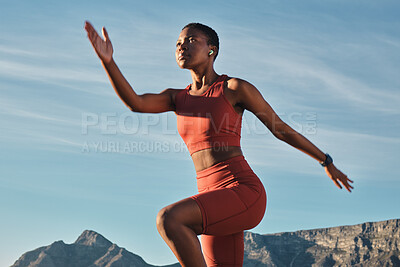 Buy stock photo Black woman runner, mountain and balance in outdoor nature for fitness, health and wellness to start morning. Woman, stretching and exercise by mountains with music, focus and workout in Cape Town