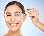 Beauty, tweezers and portrait of woman on blue background, facial grooming and professional hair removal. Spa, salon and skincare, happy woman plucking or tweezing eyebrows hair.