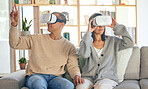 Virtual reality, 3d and a couple in the interactive metaverse while together on a sofa in the living room of a home. VR, goggles and gaming with a man and woman in their house to relax or video game