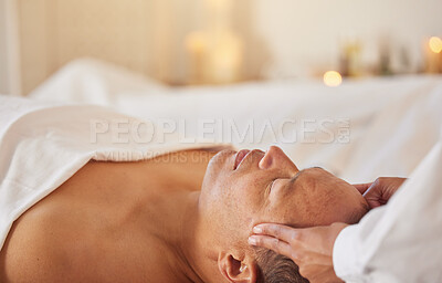 Buy stock photo Spa, man and massage for wellness, luxury and relax for health, peace or lying on table. Male person, self care and zen for healthy lifestyle, treatment or grooming for stress relief and head massage