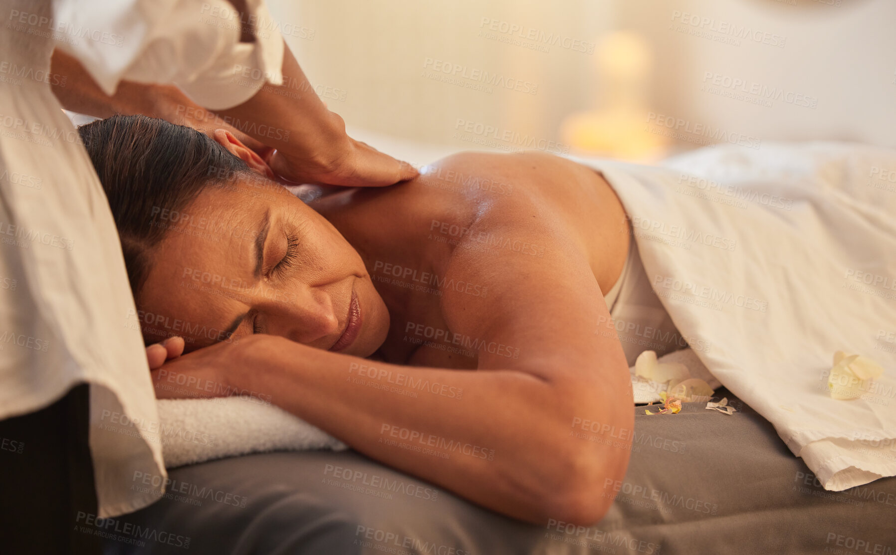 Buy stock photo Woman at spa for massage with therapist and holistic treatment, wellness and self care with aromatherapy. Luxury service, relax and peace with body care and back massage, masseuse hands for zen