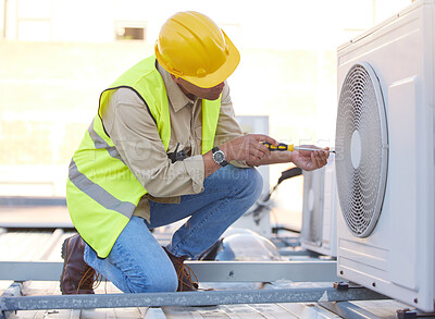 Buy stock photo Air conditioning, technician or engineer on roof for maintenance, building or construction of fan hvac repair. Air conditioner, handyman or worker with tools working on a city development project job