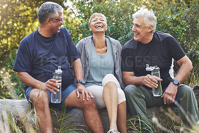 Buy stock photo Nature, fitness and senior friends in conversation while sitting in the forest after hiking. Happiness, communication and elderly people talking, bonding and drinking water after outdoor exercise.