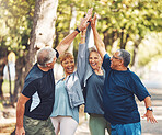 Happy, senior or people high five for fitness training goals, workout target or exercise achievement in nature. Healthy, partnership or excited elderly men and women in celebration of group teamwork 