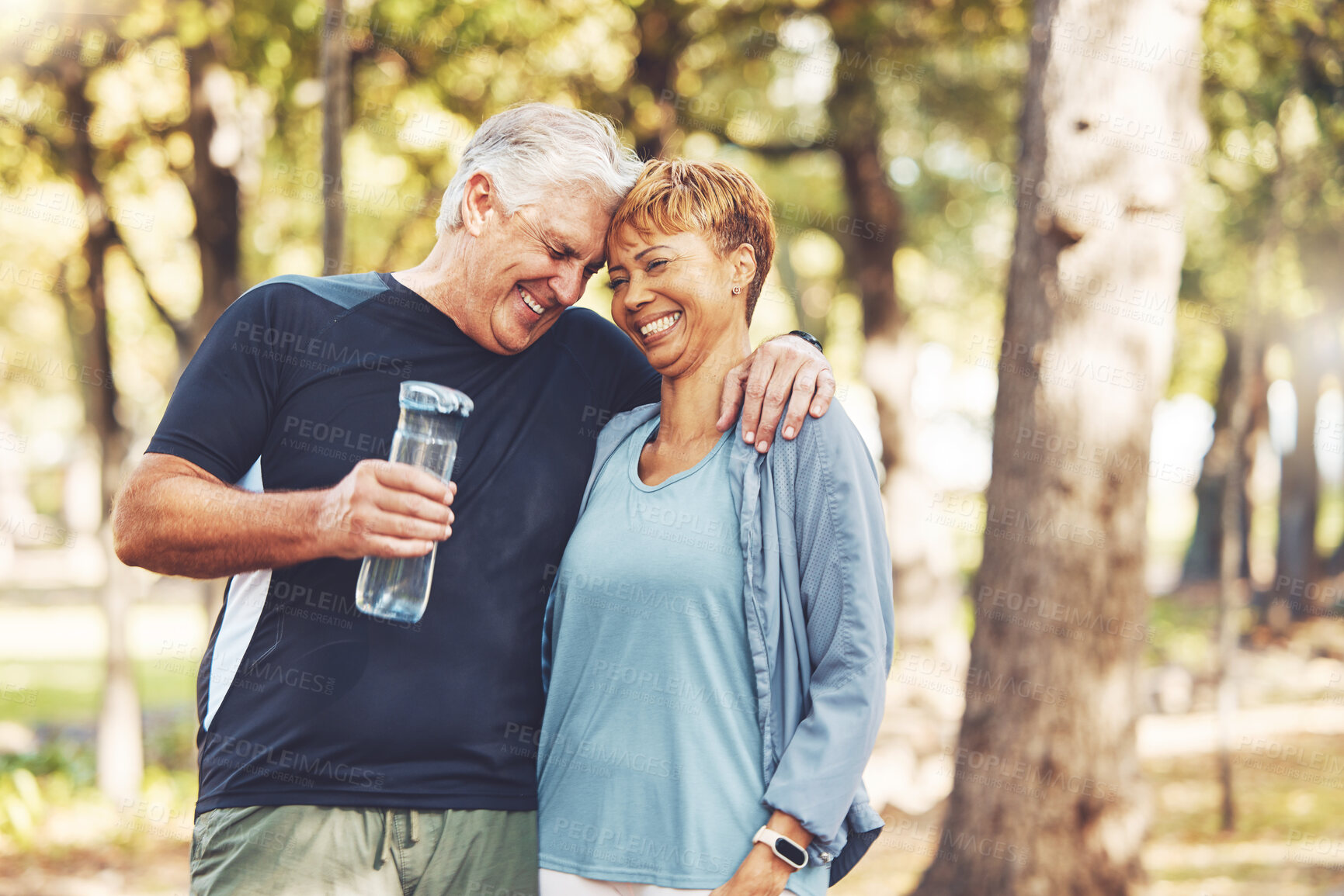 Buy stock photo Fitness, funny or old couple of friends in nature laughing at a joke after training, walking or workout. Comic, support or happy senior woman bonding with elderly partner in interracial marriage 