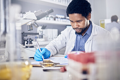 Buy stock photo Black man writing report for science experiment, scientist in lab for research to test and study for scientific innovation. Biotechnology in laboratory, focus and knowledge, pen and checklist.