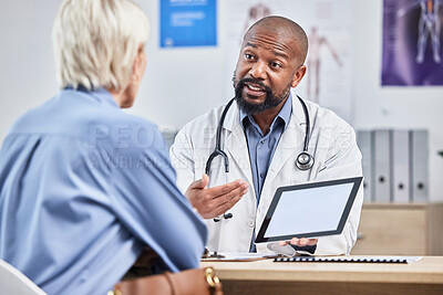Buy stock photo Doctor consultation, tablet mockup and patient consulting black man about medical results, healthcare report or hospital insurance. Mock up product placement, digital tech and advice for senior woman