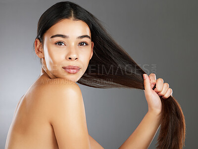 Buy stock photo Woman, hair care and beauty in studio portrait for strong, healthy natural shine and wellness by background. Model, hair glow and cosmetic beauty for health, aesthetic and confidence by backdrop
