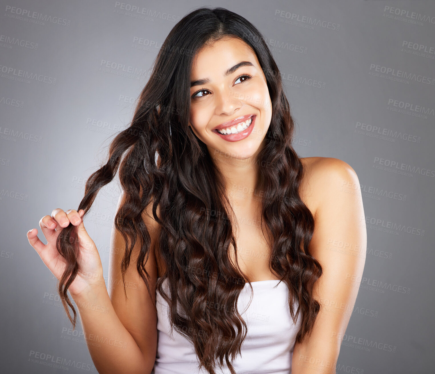 Buy stock photo Hair care, woman and shine for beauty, natural glow and on grey studio background. Female, girl and hairstyle for wellness, confident and aesthetic for luxury grooming, treatment and salon routine.