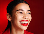 Woman, makeup and smile with lipstick in studio for beauty, cosmetics or self love with glow face. Model, natural cosmetic shine or skin wellness for self care, health and aesthetic by red background