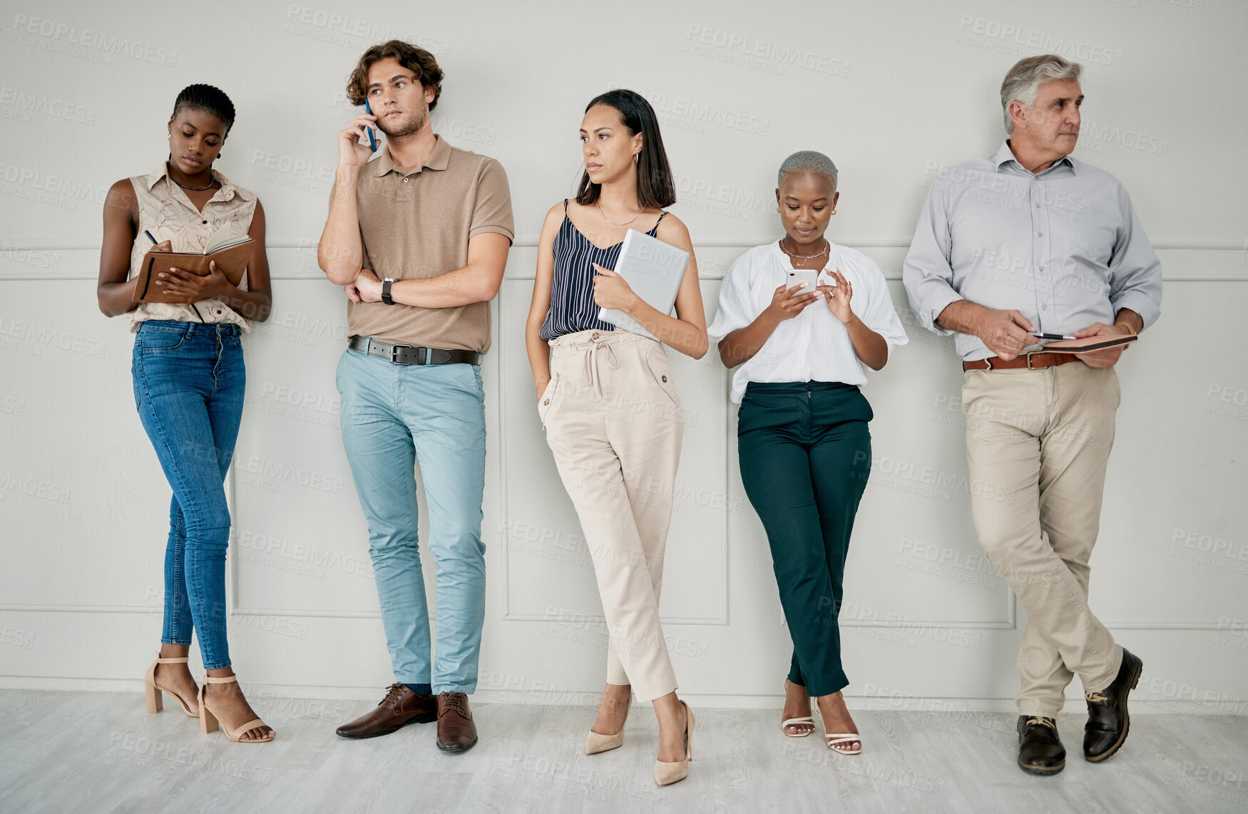 Buy stock photo Hiring, human resources or people in a waiting room for a marketing job interview at a office building. Onboarding, men and business women with career goals wait as a group for company hr manager