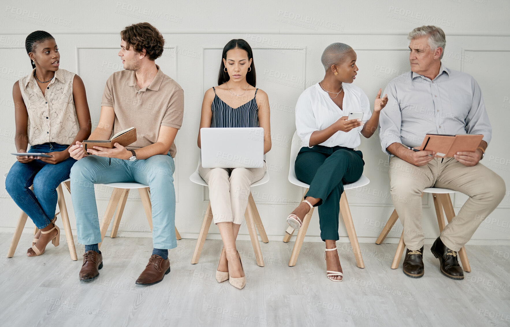 Buy stock photo Hiring, recruitment or people in a waiting room for a marketing job interview at a office building. Human resources, men and business women with career goals wait as a group for company hr manager