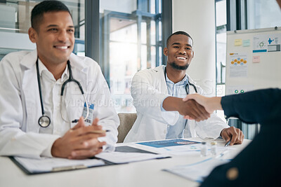 Buy stock photo Doctor, handshake and meeting with patient, smile and greeting for vaccination education, talk or help. Black man, doctors and shaking hands with client for wellness, healthcare or medicine in clinic