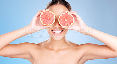 Buy stock photo Grapefruit, skincare and wellness of a woman with fruit, happiness smile or healthcare face glow. Model, happy or girl  with fruits for health, cosmetic and healthy aesthetic facial beauty with food