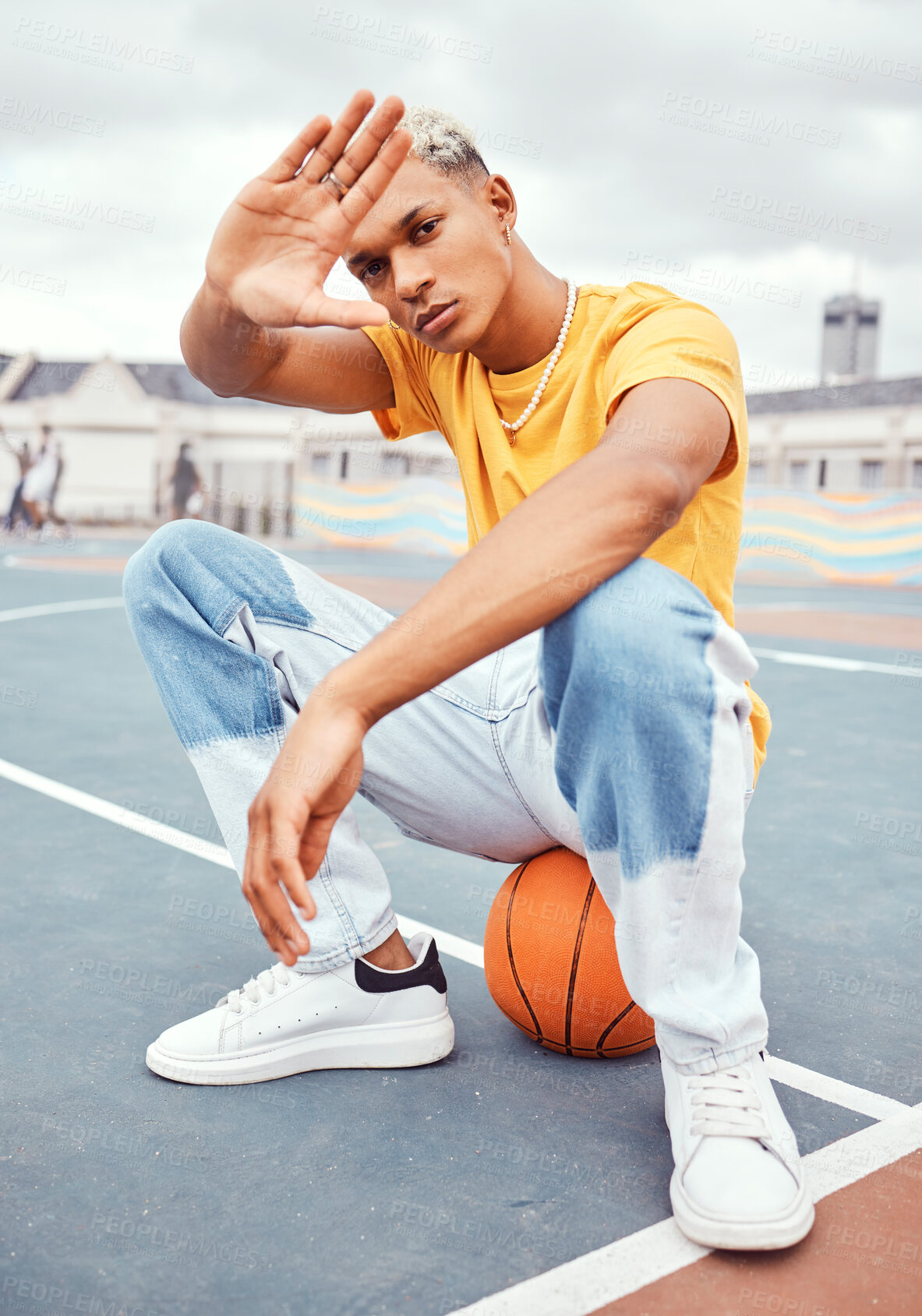 Buy stock photo Basketball, fashion and portrait of black man on basketball court with hand frame for beauty, style and outfit. Sports, leisure and and male model with hand frame and edgy clothes in urban park