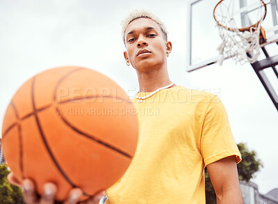 Buy stock photo Sports, basketball court and a portrait of man with ball outside at park. Exercise, motivation and workout for fitness, wellness and health. Street game, outdoor basketball training and serious face.