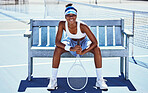 Fitness, tennis and portrait of a woman player sitting on the bench to rest after an outdoor match. Sports, training and healthy African female athlete practicing for a game, tournament or exercise.