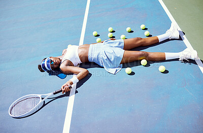 Buy stock photo Tired, tennis and sad black woman on a court after a game, sports fitness and training fail in London. Depression, exercise and African tennis player on the floor after a loss in a professional match