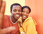 Selfie, love and memories with a black couple posing for a photograph together on a color wall background. Portrait, happy and smile with a man and woman taking a picture while bonding outside