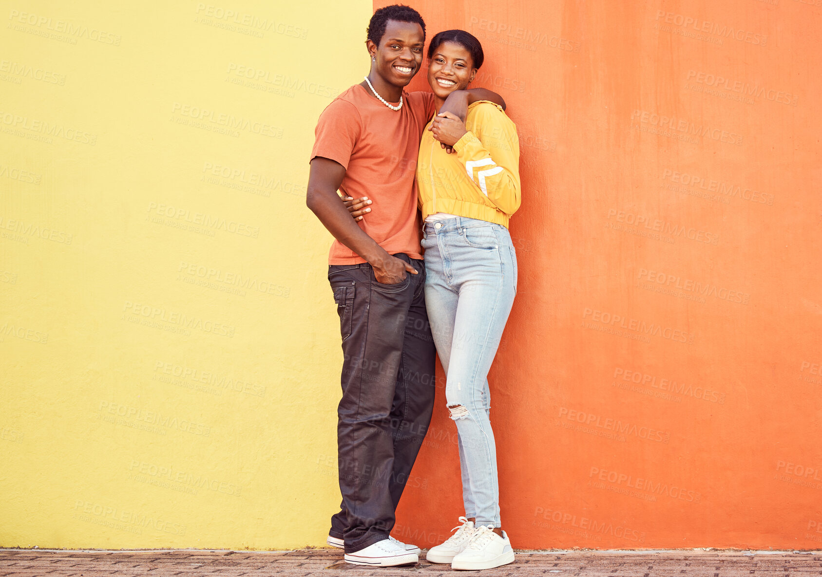 Buy stock photo Portrait, love and mockup with a black couple dating outdoor on a color wall background together with mockup. Happy, smile and trust with a man and woman bonding while out in town on a summer day