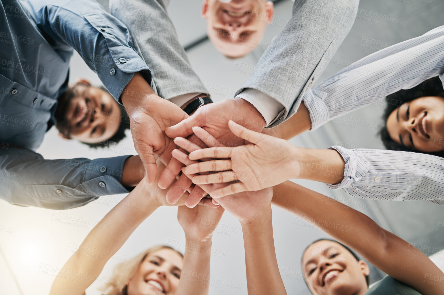 Buy stock photo Team building, hands or happy business people with support, mission or goals for success in office building. Low angle, meeting or employees in partnership working with hope, team work or motivation