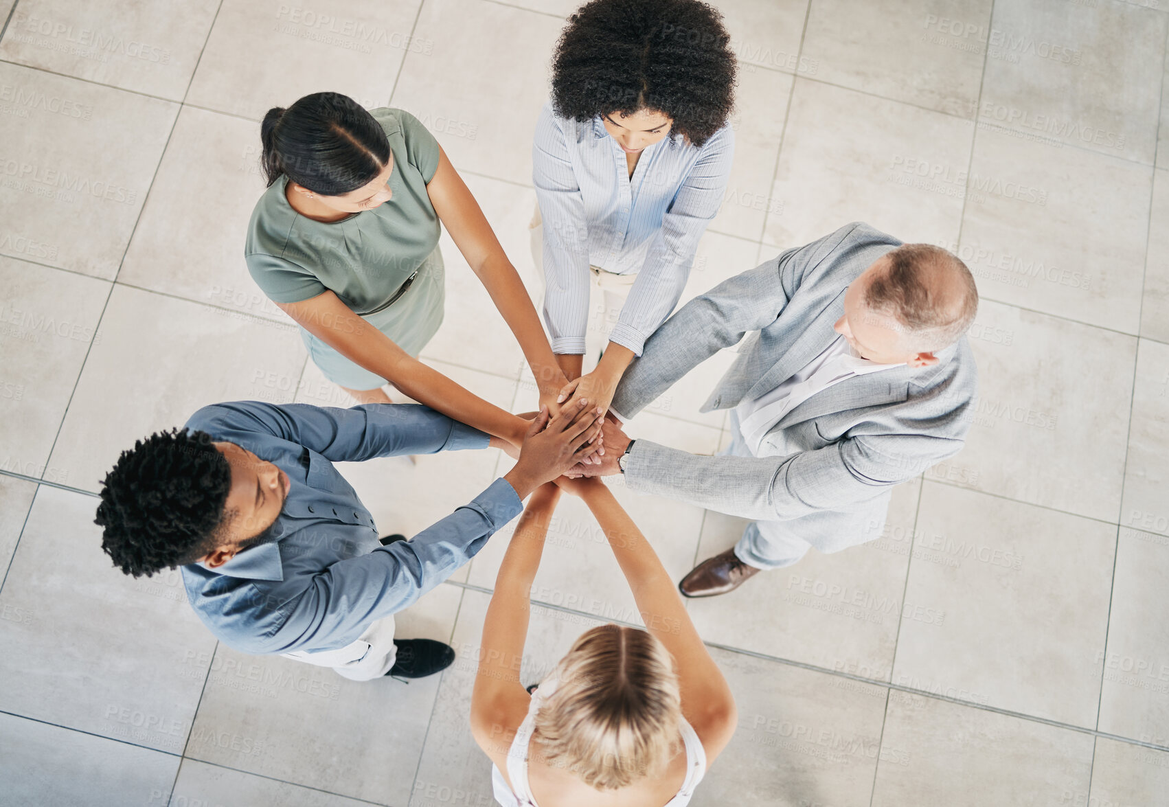 Buy stock photo Office, business people and top view of a stack of hands for celebration, motivation or team building. Collaboration, diversity and overhead of a corporate team cheering for teamwork in the workplace