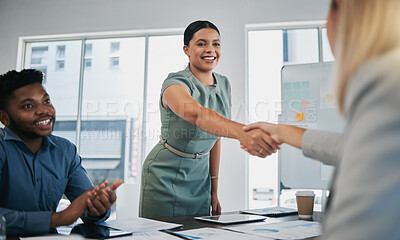 Buy stock photo Business people, woman and handshake at meeting, planning and chart on board for target, success or goal. Corporate finance group, applause and celebration for profit, promotion or vision in New York