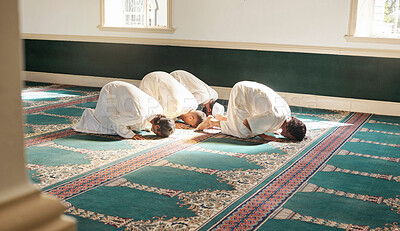 Buy stock photo Muslim, prayer and mosque with a holy man group praying together for fajr, dhuhr or asr, otherwise maghrib or isha'a. Salah, worship and pray with islamic friends at ramadan for religion in sun rays