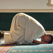 Islam, religion and prayer of a muslim man at mosque in ramadan for ...