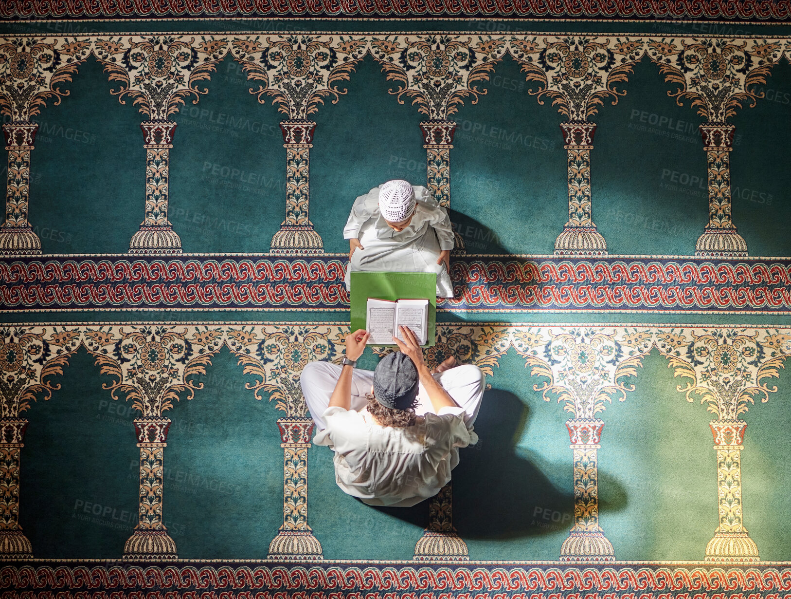 Buy stock photo Muslim pray, child or man in praying with Quran for peace, mindfulness or support from Allah in holy mosque. Top view, Islamic kid or person studying or praying to help worship God on Ramadan Kareem