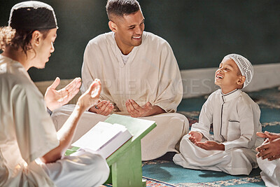 Buy stock photo Muslim child, mosque and quran with teacher for spiritual learning, development or growth on carpet. Islamic teaching, man and boy for holy worship, book or reading for faith, islam or study in Qatar