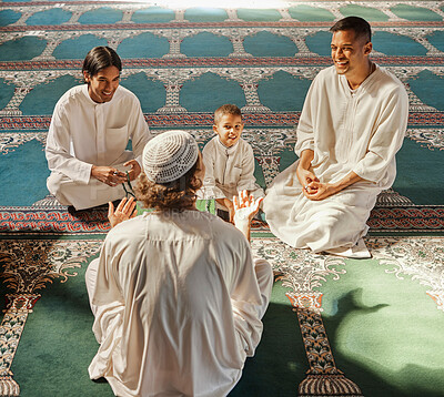 Buy stock photo Muslim, child or men prayer to worship Allah in holy temple or mosque with gratitude as a family on Ramadan. Islamic, community or people in praying with boy or kid for Gods support, spiritual peace