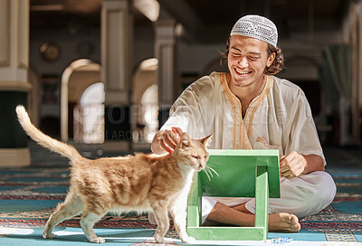 Buy stock photo Muslim, man and cat in a mosque, happy and smile during, worship, prayer and bonding. Islamic, male and animal in holy, religious place for praying, humble and sitting for pray and learning