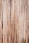 Hair care, blonde and woman with straight hair from the hair salon, cosmetic beauty and natural shine. Color, zoom and model with a hairstyle from a hairdresser for long hair, styling and gloss