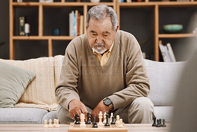 Buy stock photo Senior man, thinking or playing chess in house, home living room or apartment in Japanese strategy, checkmate or board game contest. Retirement elderly, smart person or chessboard challenge for mind